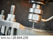 drill drilling a hole on metalworking machine. Стоковое фото, фотограф Дмитрий Калиновский / Фотобанк Лори