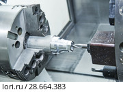 metalworking drilling process on lathe CNC center. Стоковое фото, фотограф Дмитрий Калиновский / Фотобанк Лори
