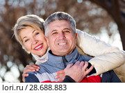Mature married couple embracing on sunny day. Стоковое фото, фотограф Яков Филимонов / Фотобанк Лори