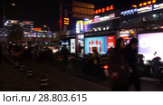 Ночной Пекин. Уличное движение. Beijing in evening - traffic at the crossroads. (2018 год). Стоковое видео, видеограф Евгений Романов / Фотобанк Лори