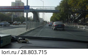 Пекин. Движение на улицах. Beijing. Traffic during the day. Streets of the city. (2018 год). Стоковое видео, видеограф Евгений Романов / Фотобанк Лори