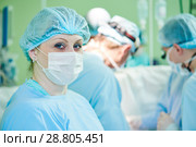 female surgeon nurse at child operating room. Стоковое фото, фотограф Дмитрий Калиновский / Фотобанк Лори