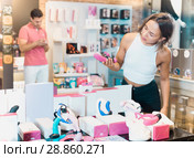 vendee touching different sexy toys. Стоковое фото, фотограф Яков Филимонов / Фотобанк Лори