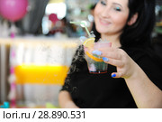 Attractive girl in a bar with cocktail (2016 год). Редакционное фото, фотограф Георгий Ильин / Фотобанк Лори