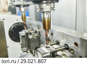 two spindel CNC milling machine at simultaneous metal working. Стоковое фото, фотограф Дмитрий Калиновский / Фотобанк Лори