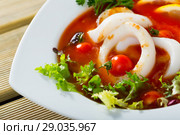 Tomato soup with squid and greens. Стоковое фото, фотограф Яков Филимонов / Фотобанк Лори
