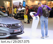 Китайский автомобиль Джили Geely Emgrand 7 на Московском Международном автосалоне ММАС 2018 MIAS в Крокус Экспо,Москва. Редакционное фото, фотограф Илья Илмарин / Фотобанк Лори