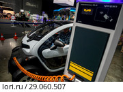 Новый электромобиль Renault Twizy  заряжается от станция зарядки электромобилей "Фора" на технологическом фестивале Mobilistic 2018 в городе Москве, Россия. Редакционное фото, фотограф Николай Винокуров / Фотобанк Лори