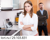 Upset girl with husband in kitchen furniture salon. Стоковое фото, фотограф Яков Филимонов / Фотобанк Лори