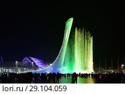 Sochi, Russia - May 29. 2018. Bowl of Olympic flame Firebird and singing Fountain in Olympic park at night. Редакционное фото, фотограф Володина Ольга / Фотобанк Лори