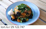 Flavored pilaf from mutton meat with dried apricots, prunes, saffron and sweet garlic. Стоковое видео, видеограф Яков Филимонов / Фотобанк Лори