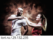 Young and sexy couple dances Caribbean Salsa. Стоковое фото, фотограф Игорь Бородин / Фотобанк Лори