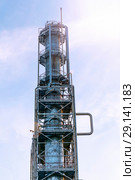 Fluid catalytic cracking unit (FCC) in a modern chemical factory. equipment of oil refinery. Стоковое фото, фотограф Евгений Харитонов / Фотобанк Лори