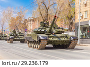 Russia, Samara, May 2018: New military modified russian army main battle tank T-72B3M in green camouflage at the city street. Редакционное фото, фотограф Акиньшин Владимир / Фотобанк Лори