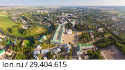 Beautiful panoramic view of Suzdal in summer at sunrise. Resurrection Church on the market square in Suzdal. Suzdal is a famous tourist attraction and part of the Golden Ring of Russia. Стоковое фото, фотограф Mikhail Starodubov / Фотобанк Лори