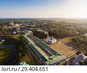 Beautiful panoramic view of Suzdal in summer at sunrise. Resurrection Church on the market square in Suzdal. Suzdal is a famous tourist attraction and part of the Golden Ring of Russia. Стоковое фото, фотограф Mikhail Starodubov / Фотобанк Лори