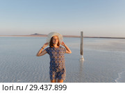 happy smiling girl in white hat enjoying sun, expanse of Bascunchak salt lake. Стоковое фото, фотограф Ирина Мойсеева / Фотобанк Лори