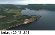 Aerial view of the cliffs near the river. Стоковое видео, видеограф Виктор Аллин / Фотобанк Лори