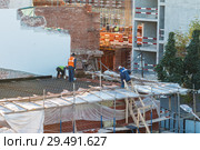 Construction site, structural steel beam build large residential buildings at construction site . Стоковое фото, фотограф Николай Чутчиков / Фотобанк Лори