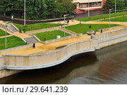 Kaliningrad, Russia - August 18, 2016: new embankment of Admiral Tributz, a favorite place of rest for citizens and guests of the city, a tourist attraction of Kaliningrad. Стоковое фото, фотограф Сергей Трофименко / Фотобанк Лори