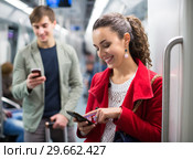 Passengers in metro wagon. Стоковое фото, фотограф Яков Филимонов / Фотобанк Лори