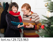 Mature woman participating in survey at home. Стоковое фото, фотограф Яков Филимонов / Фотобанк Лори