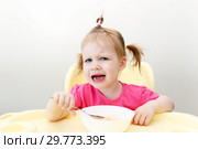 Crying little girl dont want to eat soup. Стоковое фото, фотограф ivolodina / Фотобанк Лори