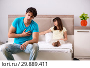 Young family having problems in relationships. Стоковое фото, фотограф Elnur / Фотобанк Лори