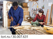 Restorers working with wooden furniture. Стоковое фото, фотограф Яков Филимонов / Фотобанк Лори