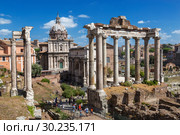 View of the ruins of the Roman forum with the Church of St. Luke and Martina, the triumphal arch of Septimus of the North and the temple of Saturn. Rome, Italy (2017 год). Стоковое фото, фотограф Наталья Волкова / Фотобанк Лори