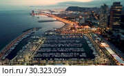Landscape of illuminated Barceloneta Beach in summer night in Barcelona, Spain (2018 год). Редакционное видео, видеограф Яков Филимонов / Фотобанк Лори