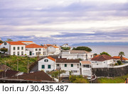 Dawn in the Azores. Scenic lilac clouds over the town of Sao Roque, Pico Island, Azores (2012 год). Стоковое фото, фотограф Юлия Бабкина / Фотобанк Лори