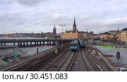 Вид на метромост Gamla Stan Tunnelbanabron мартовским днем (таймлапс). Стокгольм, Швеция (2019 год). Редакционное видео, видеограф Виктор Карасев / Фотобанк Лори