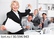 Happy team with businesswoman celebrating victory. Стоковое фото, фотограф Яков Филимонов / Фотобанк Лори