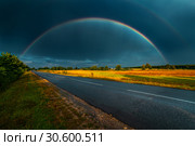 Двойная радуга после бури. Стоковое фото, фотограф Евгений Горбунов / Фотобанк Лори