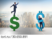 Businessman in dollar and debt concept. Стоковое фото, фотограф Elnur / Фотобанк Лори