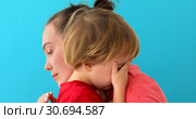 woman soothes crying son. Стоковое фото, фотограф Ekaterina Demidova / Фотобанк Лори