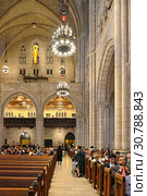 MSM Commencement ceremony each May at Riverside Church is important celebration of enormous achievements of graduates. Ceremony guests. Waiting (2019 год). Редакционное фото, фотограф Валерия Попова / Фотобанк Лори