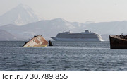 Cruise Liner Viking Orion sailing in ocean on background volcano mount coastline (2019 год). Редакционное видео, видеограф А. А. Пирагис / Фотобанк Лори