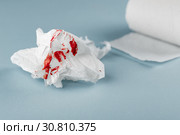 Blood on tissue paper on white background. Health medical concept. Стоковое фото, фотограф Евдокимов Максим / Фотобанк Лори