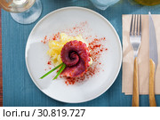 Seafood dish – boiled octopus with potato. Стоковое фото, фотограф Яков Филимонов / Фотобанк Лори