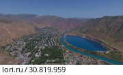 Город Нурек, плотина, водохранилище. Вид с дрона. Таджикистан (2016 год). Стоковое видео, видеограф Евгений Ковалев / Фотобанк Лори
