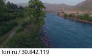 Город Нурек, плотина, водохранилище. Вид с дрона. Таджикистан (2016 год). Стоковое видео, видеограф Евгений Ковалев / Фотобанк Лори
