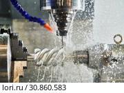 CNC milling machine work. Coolant and lubrication in gear metalwork industry. Стоковое фото, фотограф Дмитрий Калиновский / Фотобанк Лори