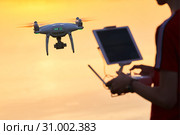 drone flying. copter pilotage at sunset. Стоковое фото, фотограф Дмитрий Калиновский / Фотобанк Лори