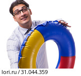 Young businessman with life buoy isolated on white background. Стоковое фото, фотограф Elnur / Фотобанк Лори