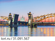 View of the Smolny Cathedral and the divorced Bolsheokhtinsky bridge during the white nights. St. Petersburg. Russia. Стоковое фото, фотограф Ольга Визави / Фотобанк Лори