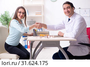 Young woman visiting male doctor oculist. Стоковое фото, фотограф Elnur / Фотобанк Лори