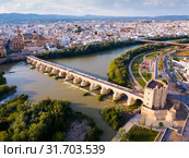 Mosque-Cathedral of Cordoba and Roman Bridge over the Guadalquivir (2019 год). Стоковое фото, фотограф Яков Филимонов / Фотобанк Лори