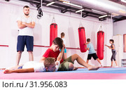 Kids practicing in pair self-protection. Стоковое фото, фотограф Яков Филимонов / Фотобанк Лори